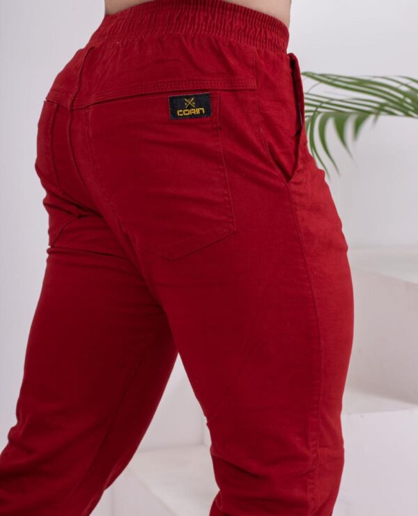 calça jogguer com torçal vermelho G